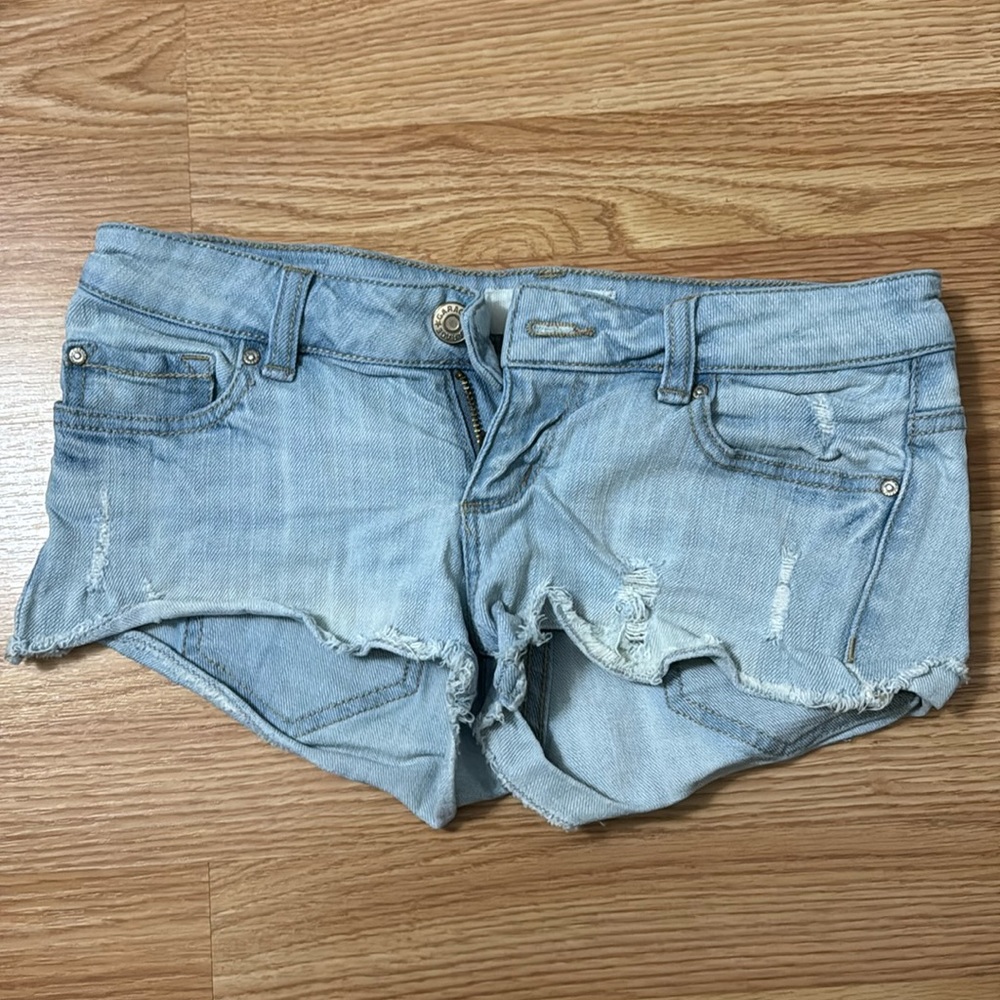 Garage distressed light wash denim short shorts